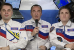 Российские космонавты с борта МКС поздравили соотечественников с Днем государственного флага